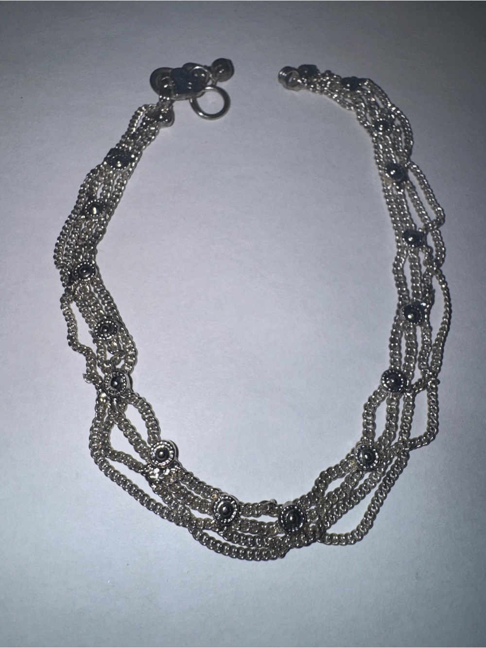 Traditiona multi-strand layered ankle bracelet (often called an Indian Payal)